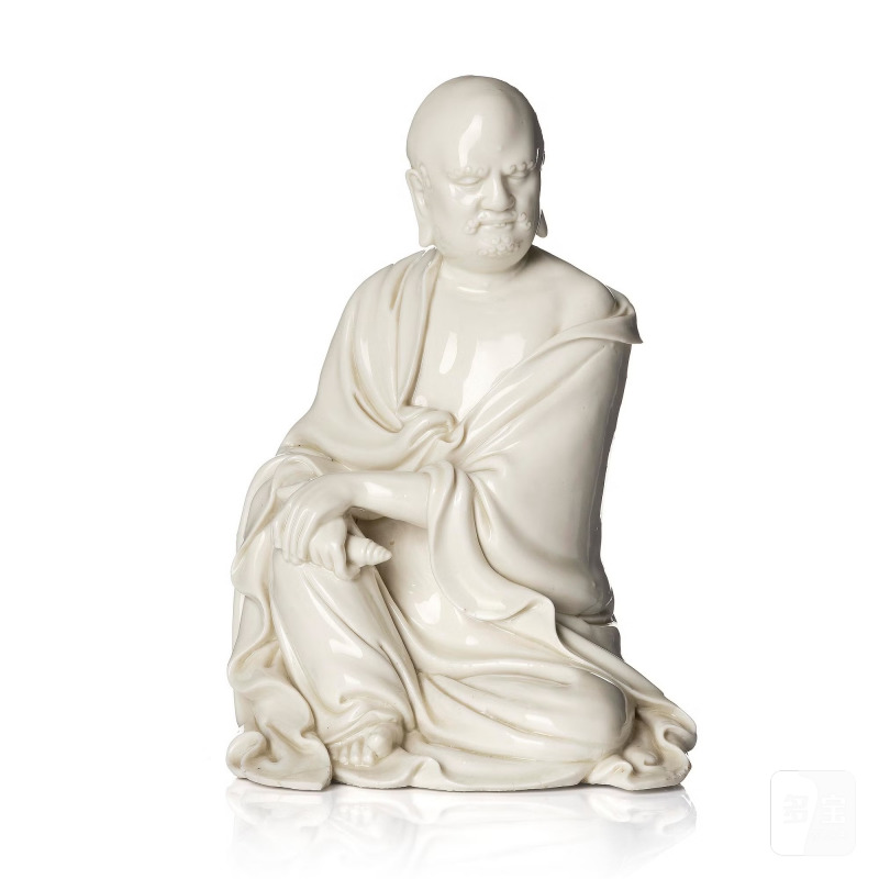 A blanc de Chine seated figure of Bodhidharma,